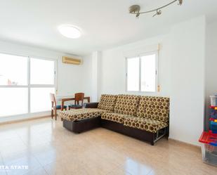 Living room of Flat for sale in  Almería Capital  with Air Conditioner, Terrace and Oven