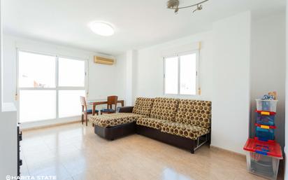 Living room of Flat for sale in  Almería Capital  with Air Conditioner, Terrace and Oven