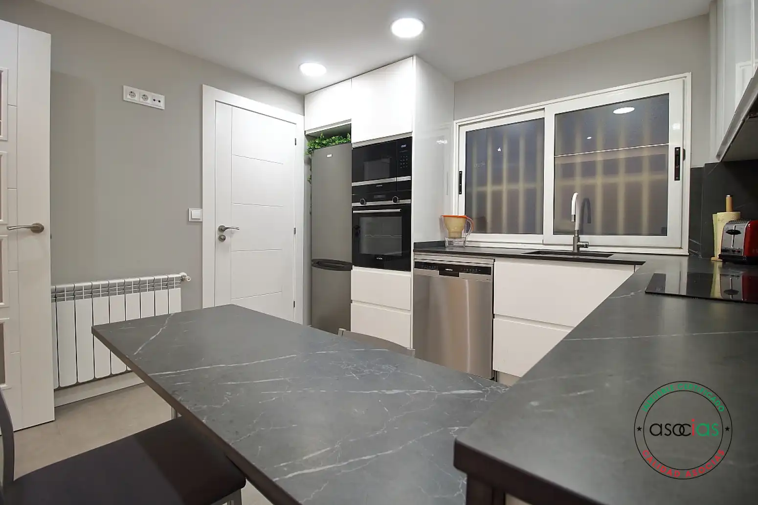 Kitchen of Flat for sale in Gijón   with Heating and Parquet flooring