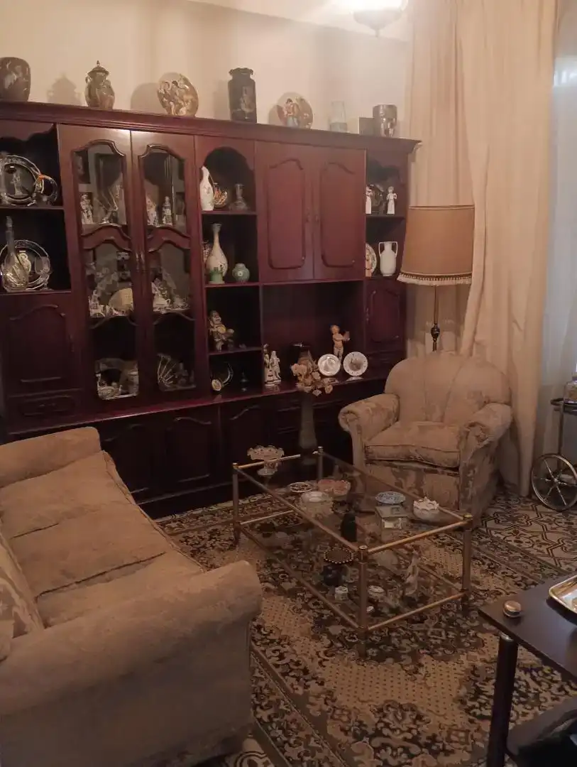 Sala d'estar de Casa adosada en venda en Montilla amb Aire condicionat, Traster i Piscina