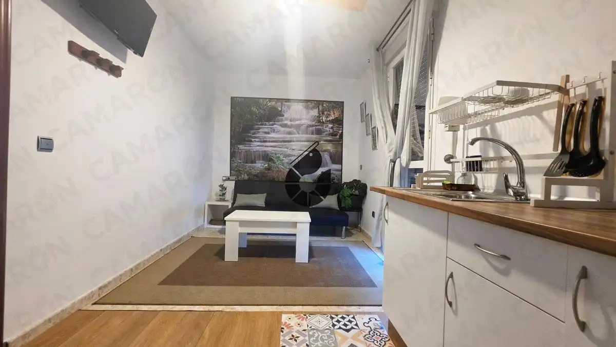 Sala de estar de Casa adosada en venta en Coria del Río con Aire acondicionado, Parquet y Terraza