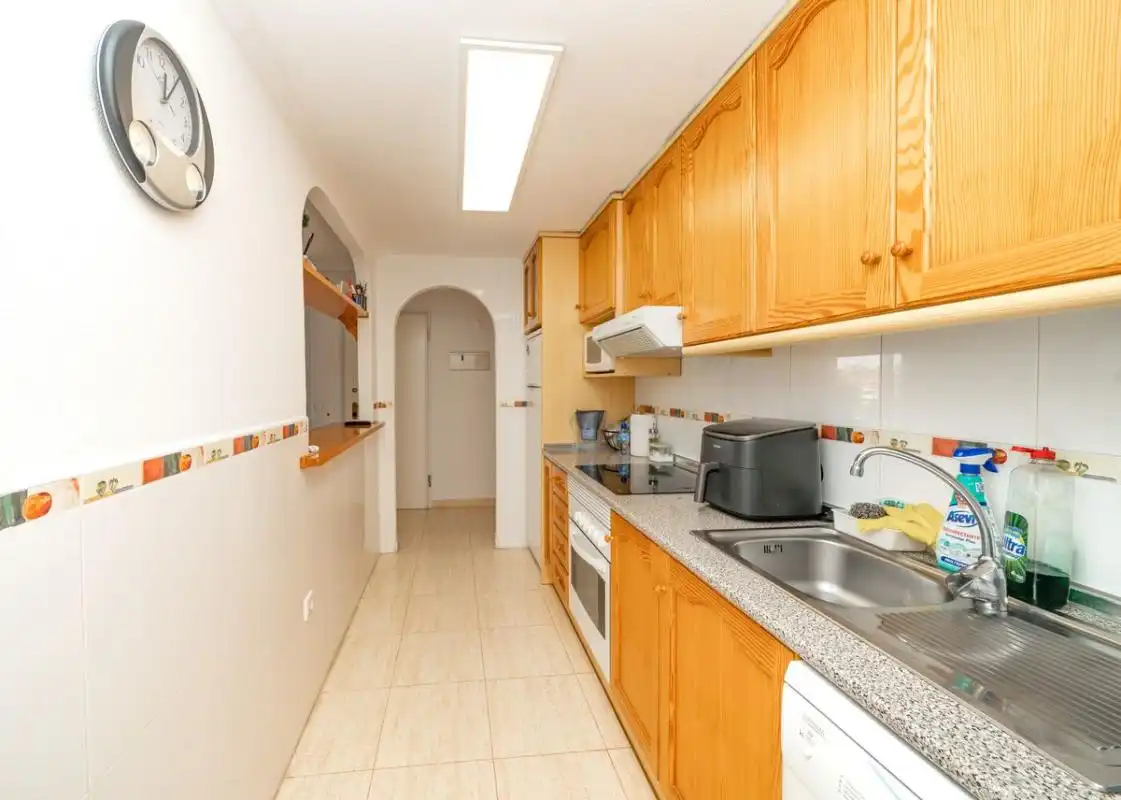 Cuina de Dúplex en venda en Pilar de la Horadada amb Aire condicionat, Calefacció i Jardí privat