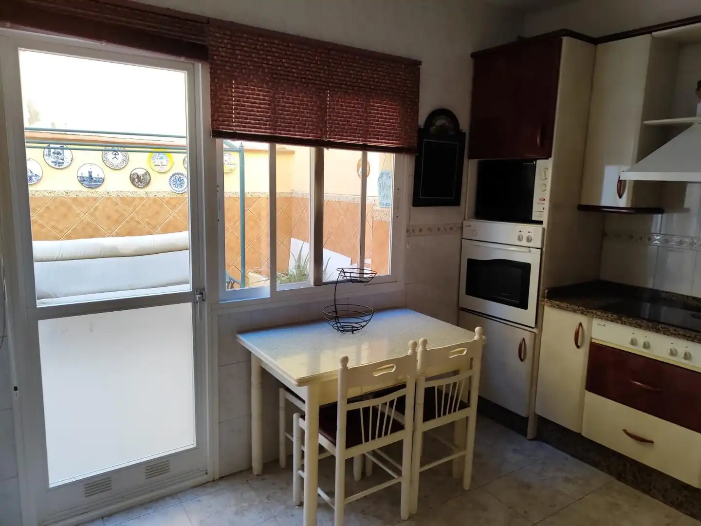 Cuina de Casa adosada en venda en Málaga amb Aire condicionat, Calefacció i Jardí privat