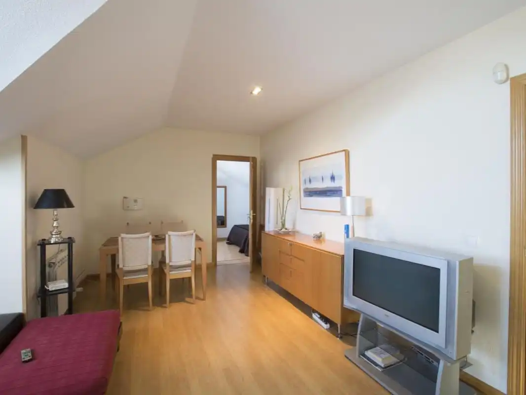 Sala d'estar de Casa o xalet per a compartir en Alpedrete, Madrid