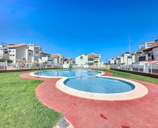 Swimming pool of Duplex for sale in Orihuela  with Air Conditioner, Terrace and Swimming Pool
