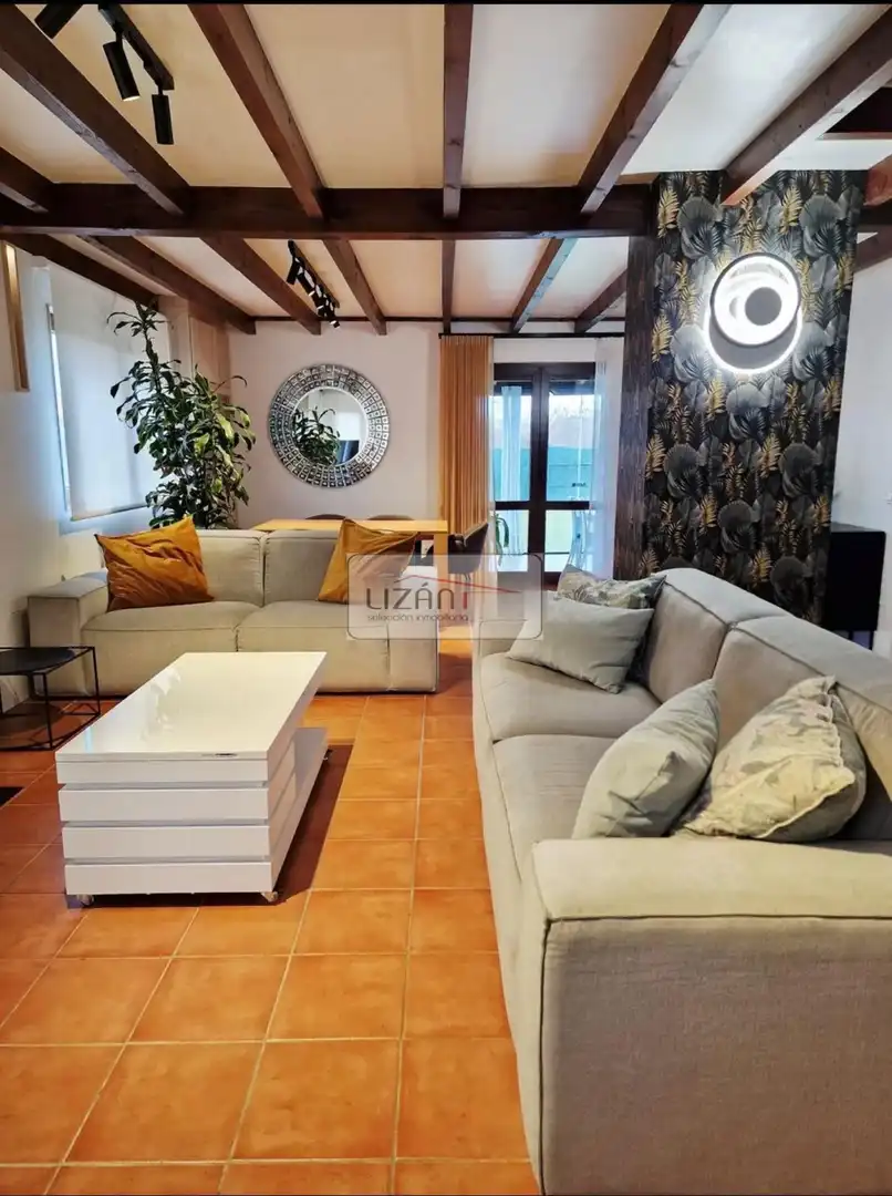 Sala de estar de Casa o chalet en venta en Villaquilambre con Calefacción, Jardín privado y Terraza