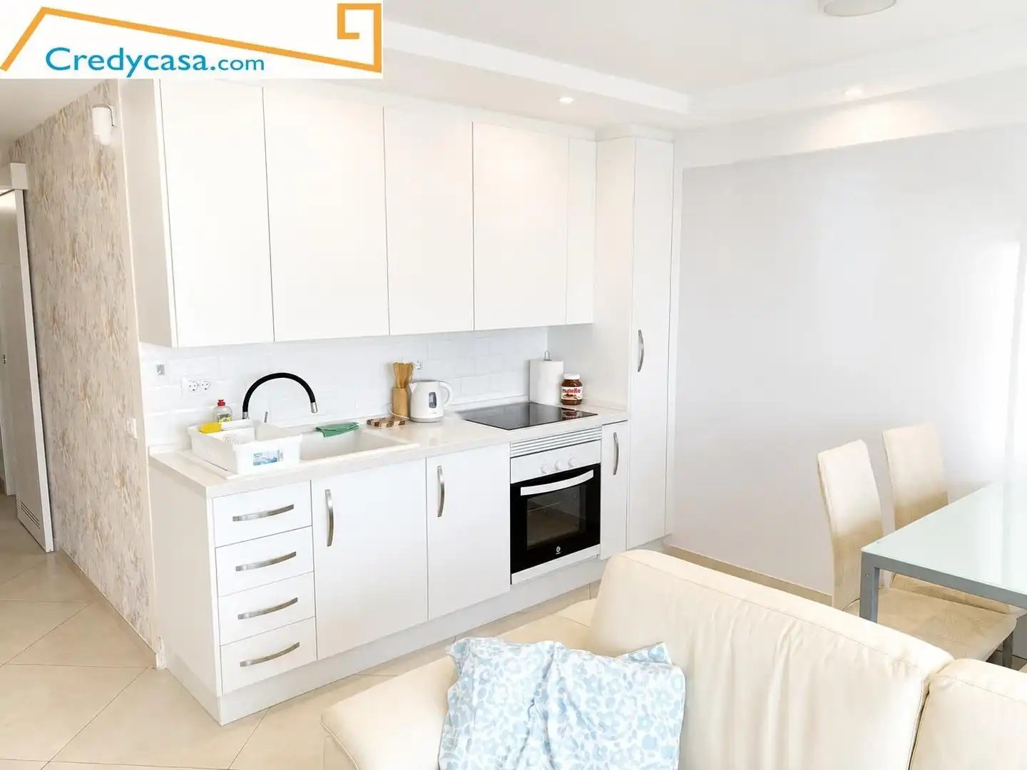 Küche von Wohnung zum Verkauf in Arona mit Privatgarten, Terrasse und Möbliert