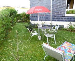 Jardí de Apartament de lloguer en Noja amb Terrassa i Piscina