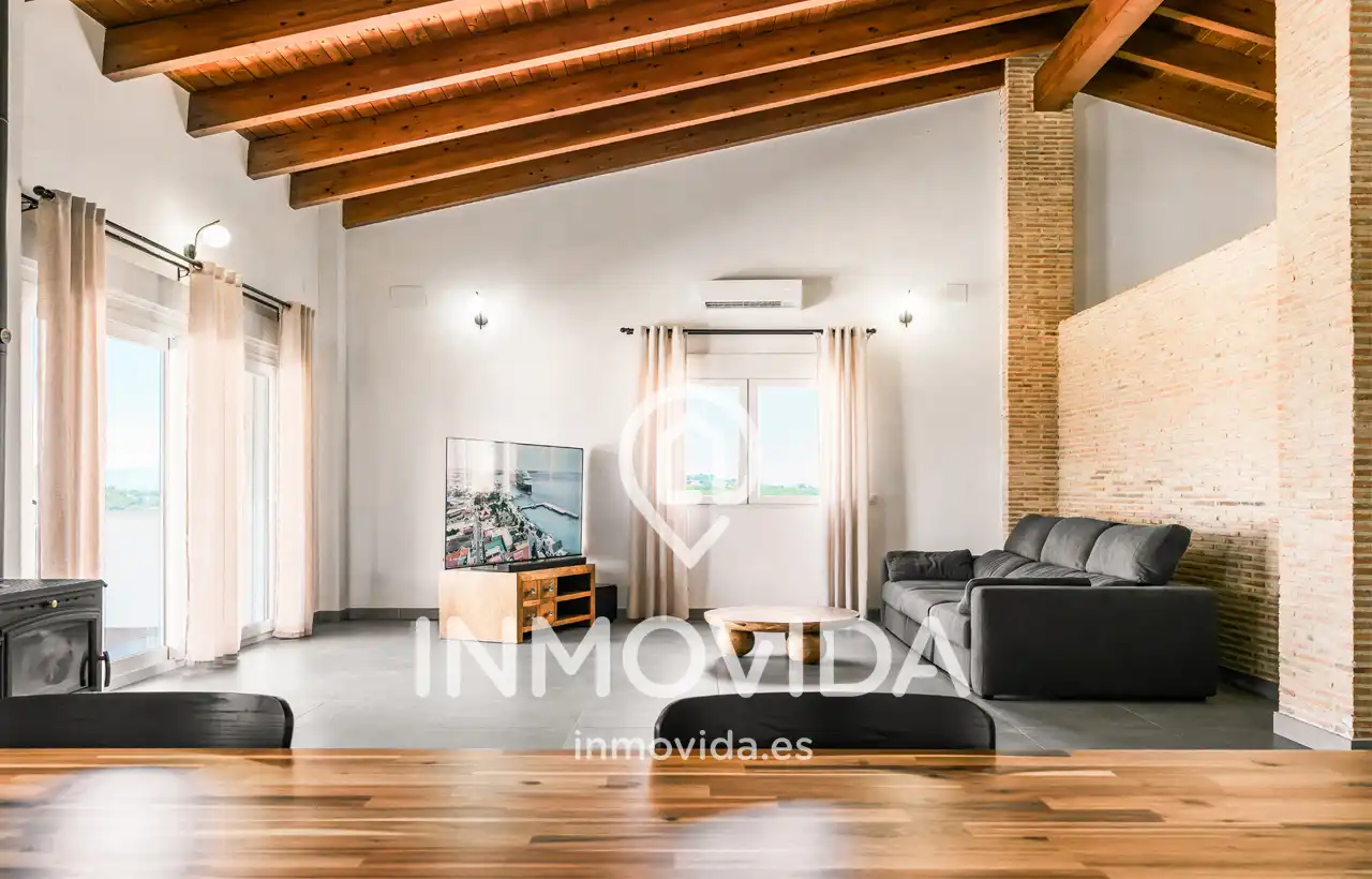 Sala d'estar de Casa o xalet en venda en L'Énova amb Aire condicionat, Jardí privat i Terrassa