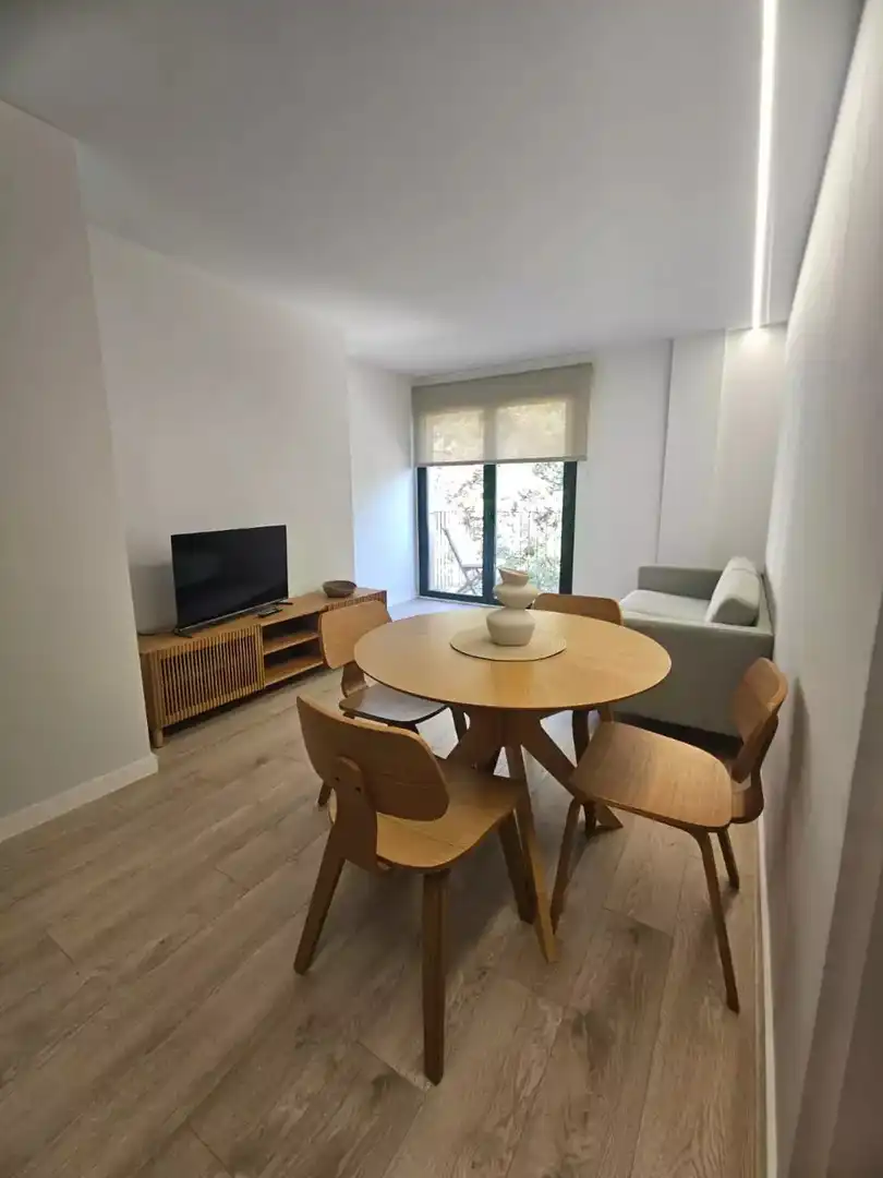 Living room of Flat for rent in Figueres  with Air Conditioner, Heating and Parquet flooring