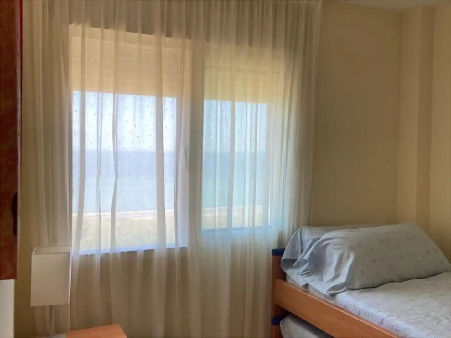 Dormitori de Pis de lloguer en La Manga del Mar Menor amb Aire condicionat, Jardí privat i Piscina