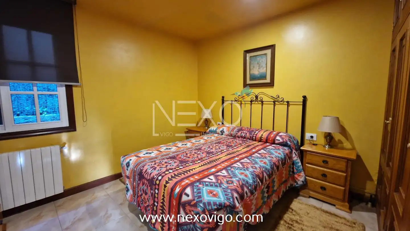 Habitación de Casa o chalet en venta en Cangas  con Calefacción, Jardín privado y Piscina