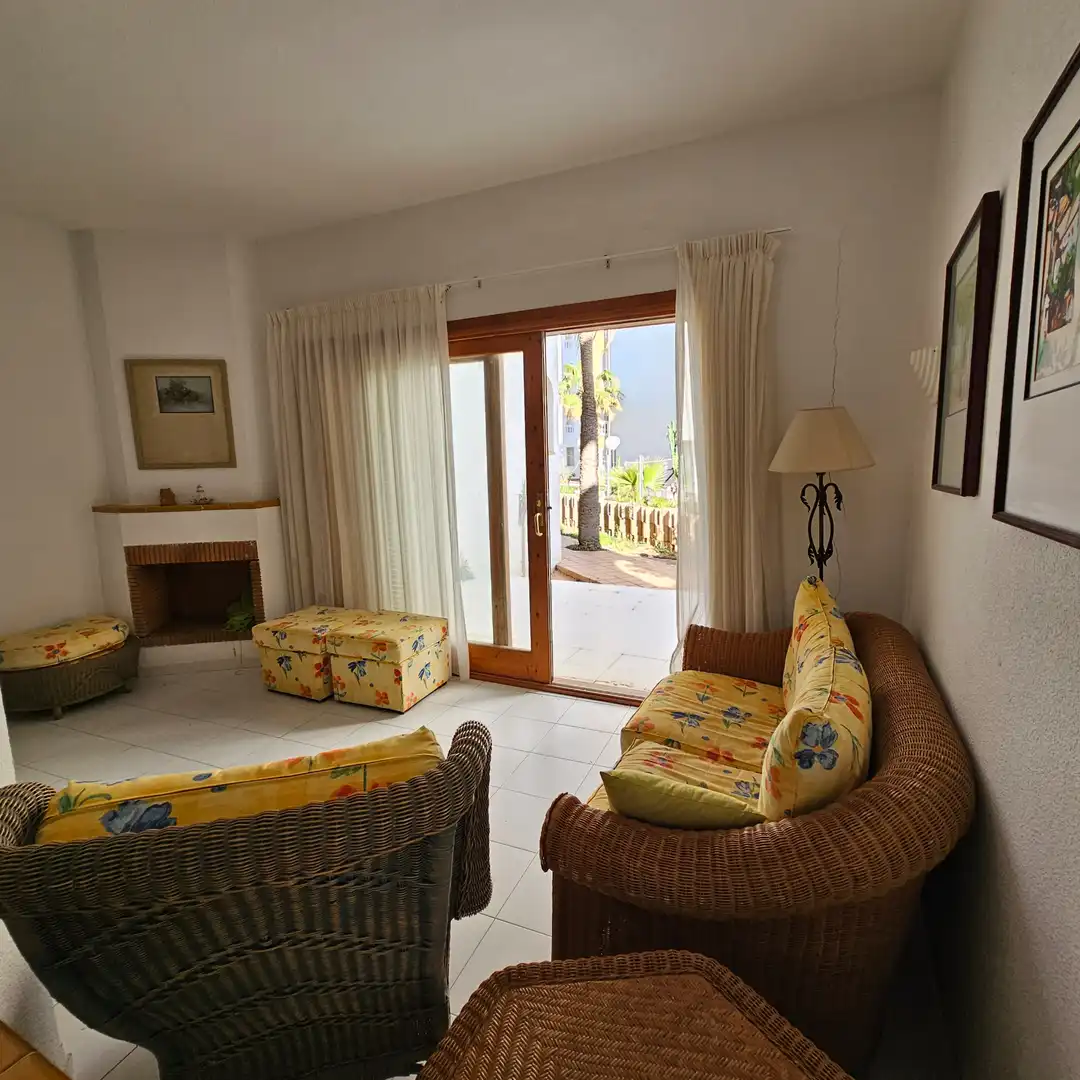 Sala d'estar de Casa adosada en venda en La Manga del Mar Menor amb Jardí privat, Terrassa i Moblat