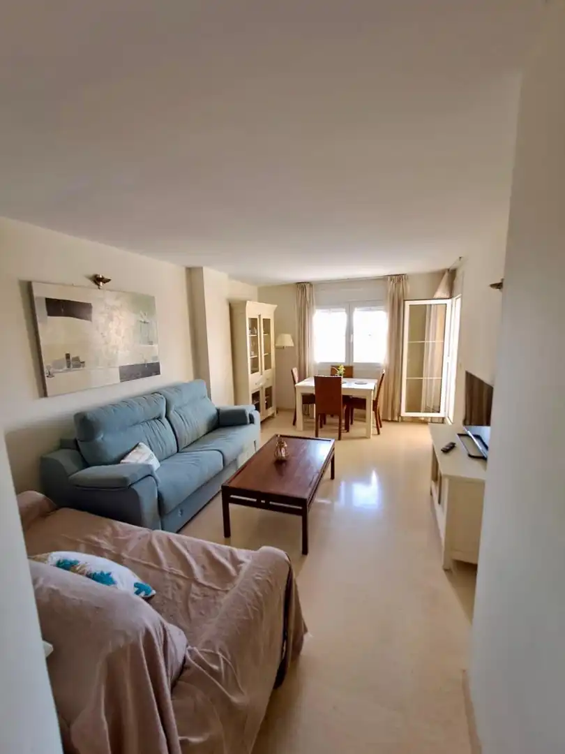 Sala d'estar de Apartament de lloguer en La Manga del Mar Menor amb Aire condicionat, Calefacció i Piscina