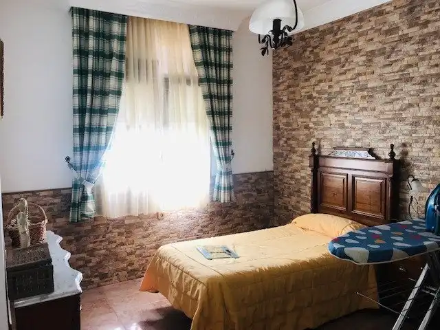 Dormitori de Casa o xalet de lloguer en Chiclana de la Frontera amb Calefacció, Jardí privat i Terrassa
