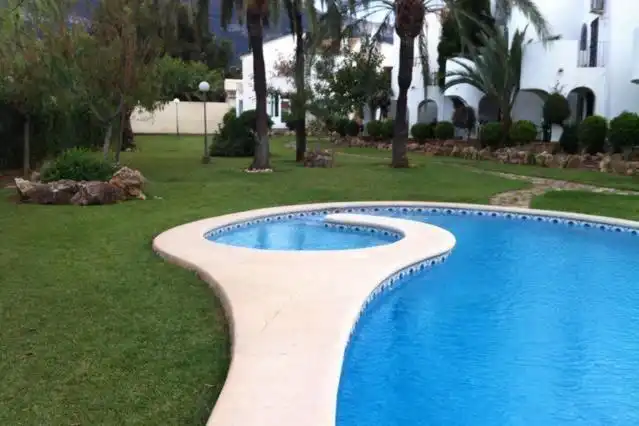Piscina de Apartament de lloguer en Dénia amb Calefacció, Balcó i Piscina comunitària