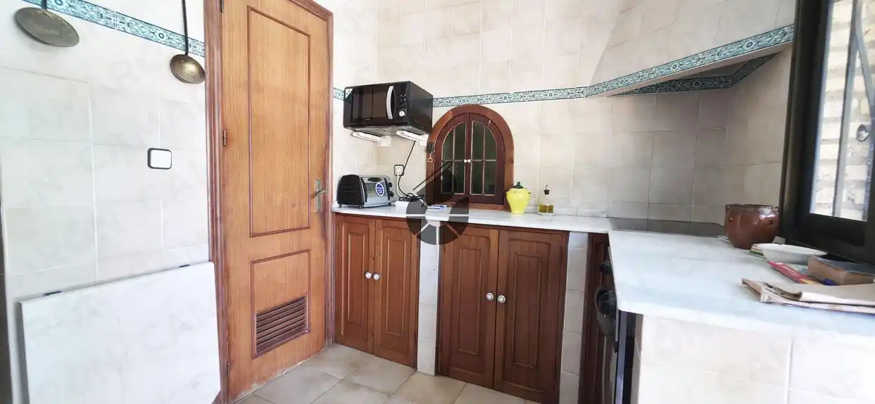 Cocina de Casa o chalet en venta en Palomares del Río con Aire acondicionado, Jardín privado y Piscina