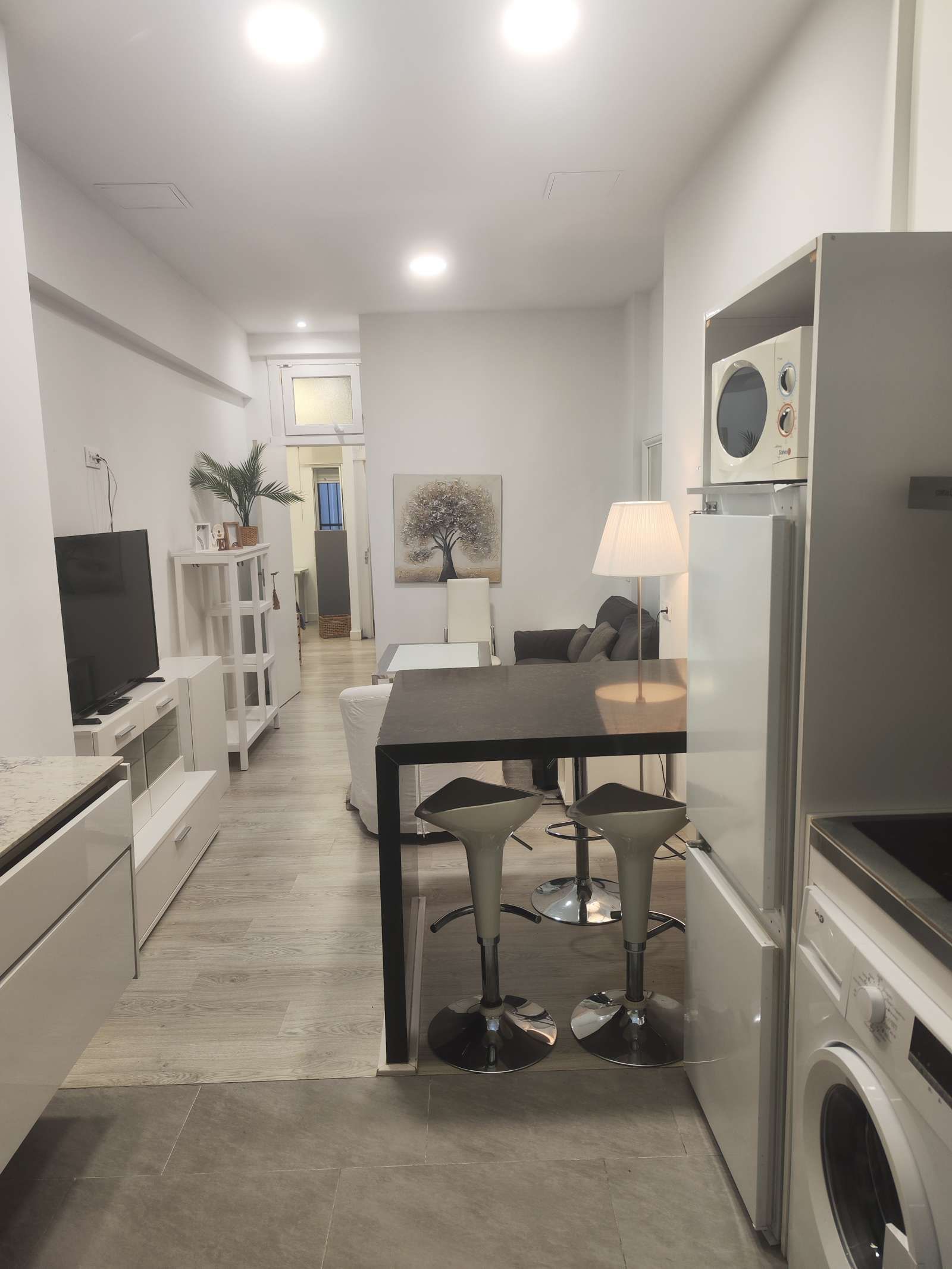 Living room of Study to share in  Sevilla Capital  with Air Conditioner and Terrace