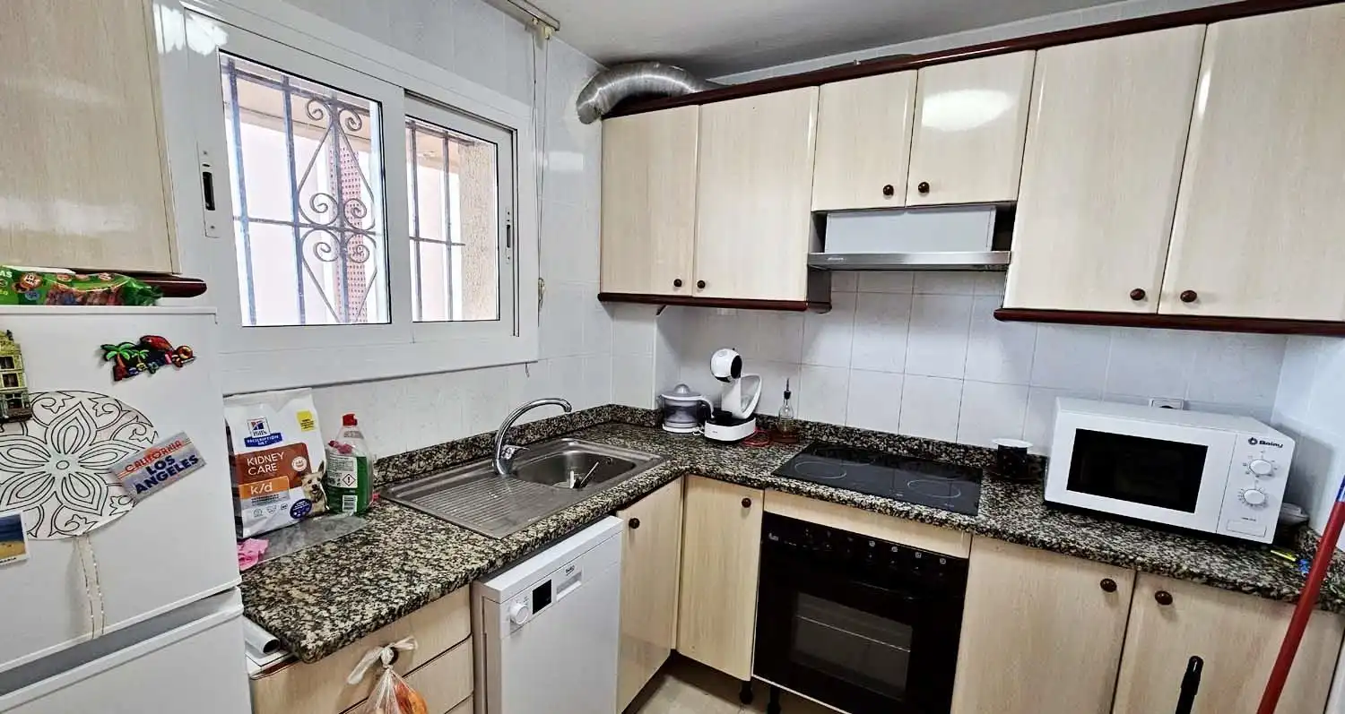 Cuina de Apartament en venda en Sant Feliu de Guíxols amb Aire condicionat, Calefacció i Jardí privat