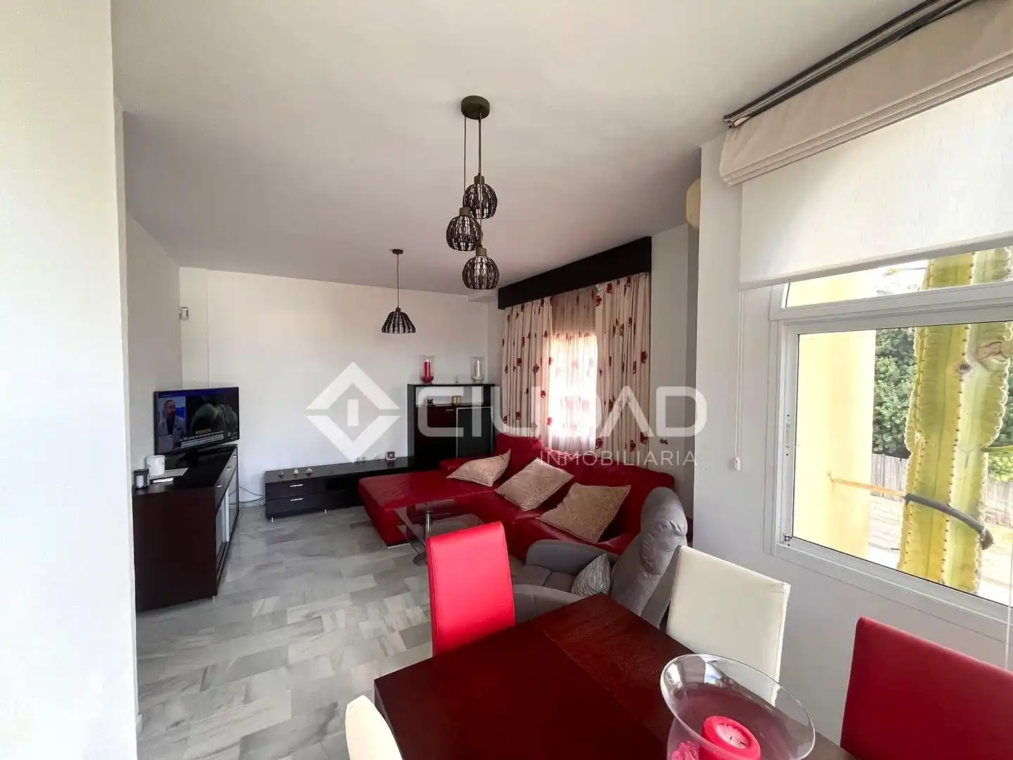 Sala de estar de Casa adosada en venta en Sanlúcar de Barrameda con Aire acondicionado, Jardín privado y Terraza