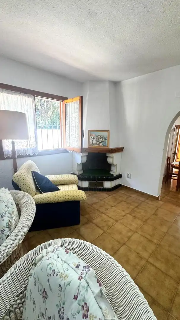 Sala d'estar de Casa adosada en venda en Orihuela amb Jardí privat, Terrassa i Traster