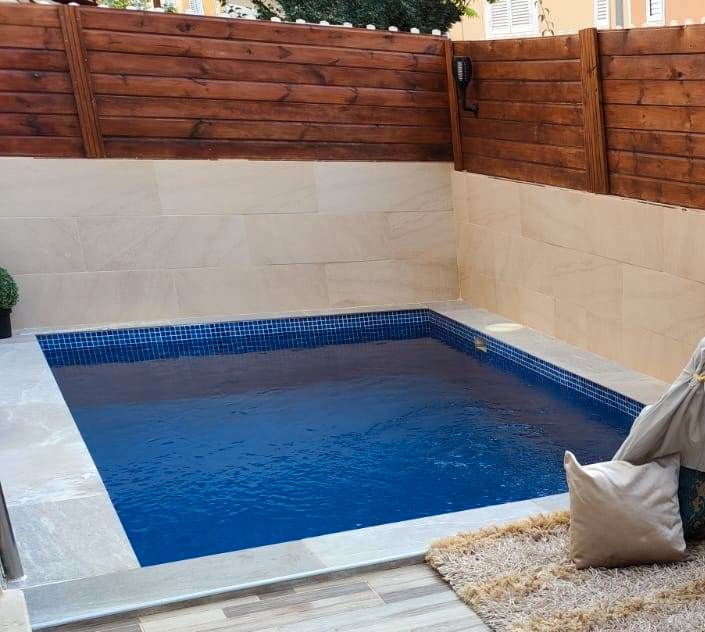 Piscina de Casa adosada en venda en San Bartolomé de Tirajana amb Aire condicionat, Terrassa i Piscina