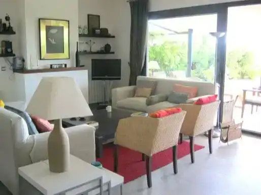 Sala d'estar de Casa o xalet de lloguer en El Rompido amb Jardí privat, Moblat i Balcó