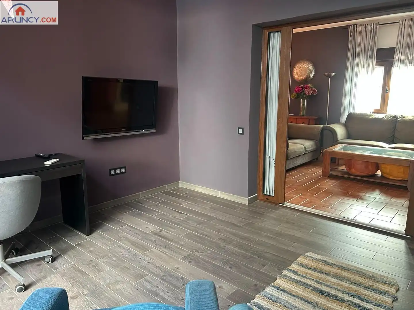 Sala d'estar de Casa adosada de lloguer en Alcalá de Guadaira amb Aire condicionat, Jardí privat i Terrassa