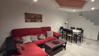 Sala d'estar de Planta baixa en venda en Roquetas de Mar amb Jardí privat, Terrassa i Piscina comunitària