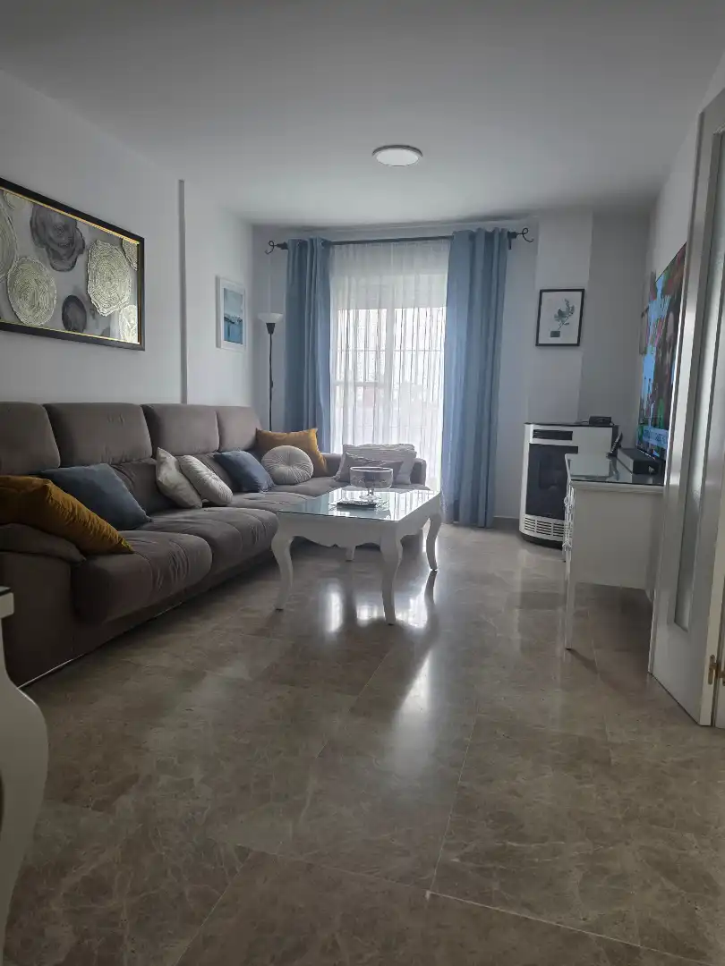 Sala de estar de Casa adosada en venta en Utrera con Aire acondicionado, Jardín privado y Terraza