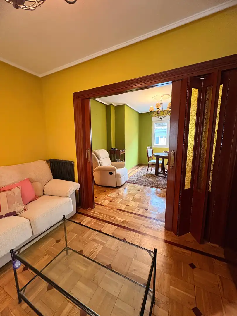 Living room of Flat for sale in Gijón   with Heating, Parquet flooring and Furnished