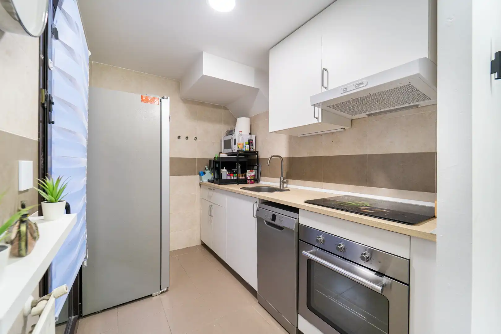 Cuina de Dúplex en venda en Sevilla la Nueva amb Aire condicionat, Calefacció i Traster