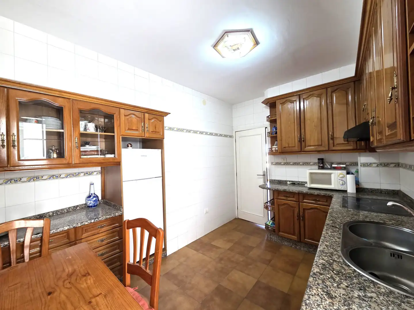 Kitchen of Flat for sale in Sanxenxo  with Parquet flooring, Terrace and Oven