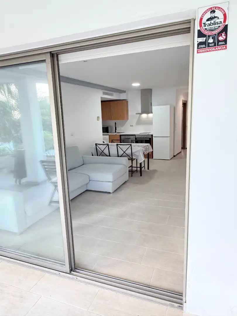 Sala de estar de Apartamento en venta en Santa Eulària des Riu con Aire acondicionado, Calefacción y Jardín privado