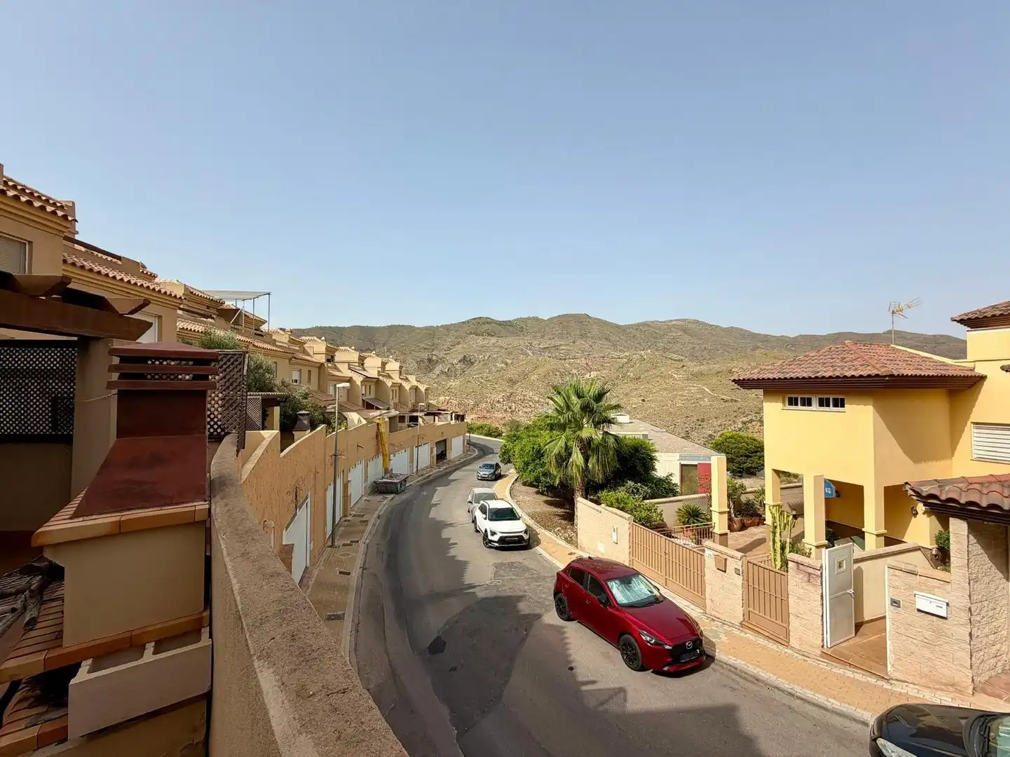 Vista exterior de Casa adosada en venda en Vícar amb Terrassa, Traster i Piscina comunitària