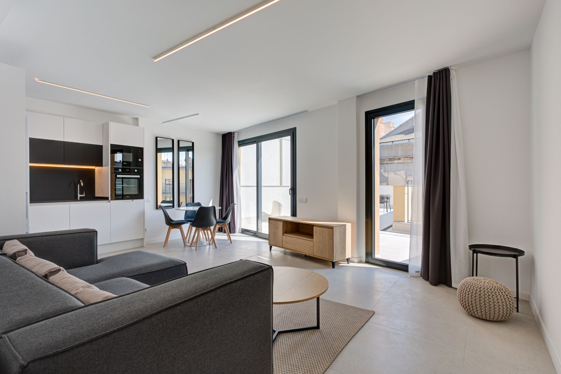 Sala d'estar de Àtic de lloguer en  Barcelona Capital amb Aire condicionat, Terrassa i Moblat