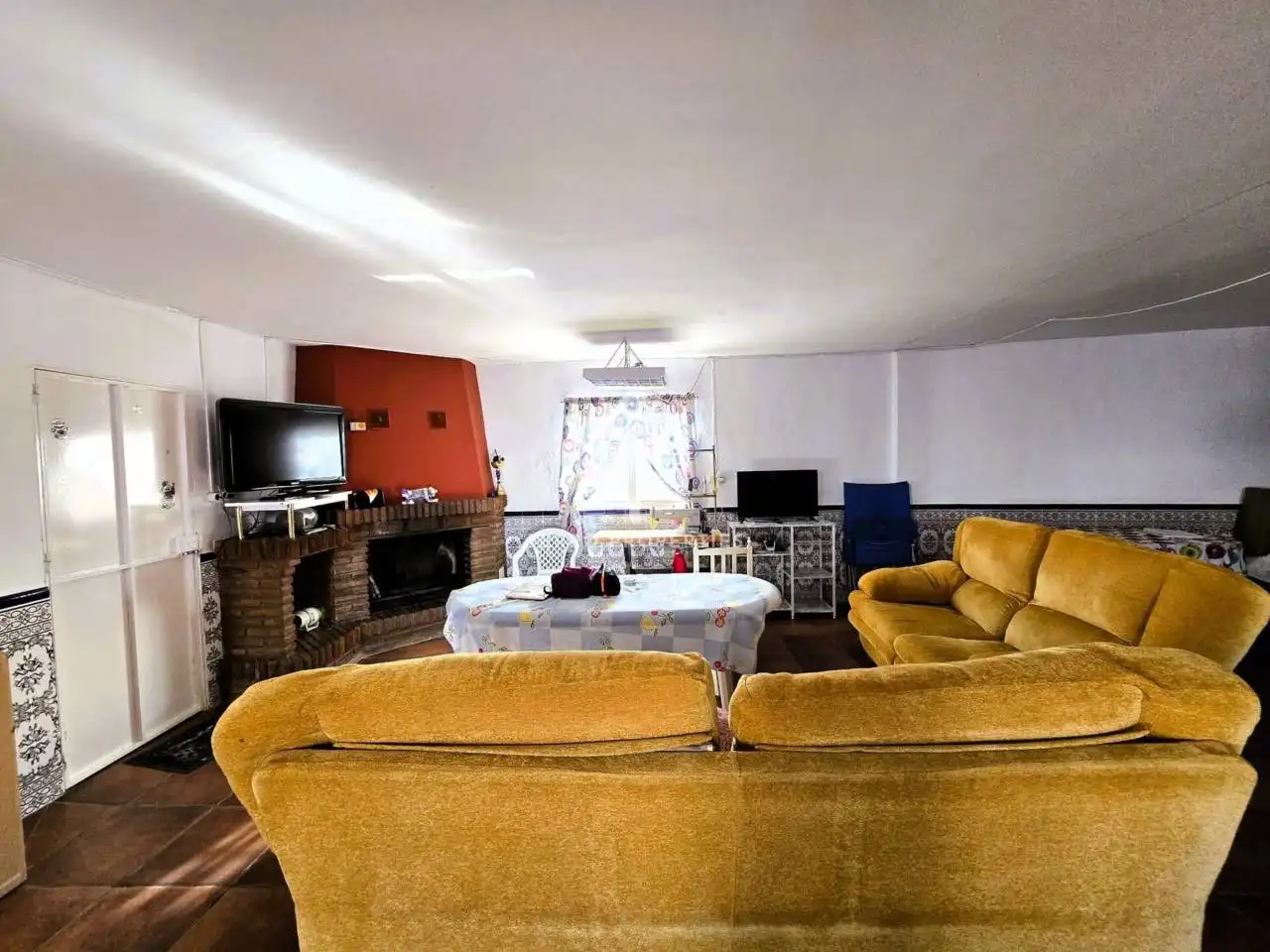 Sala d'estar de Casa o xalet en venda en Loja amb Jardí privat, Terrassa i Piscina