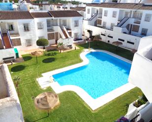 Piscina de Apartament en venda en Islantilla amb Aire condicionat, Jardí privat i Terrassa
