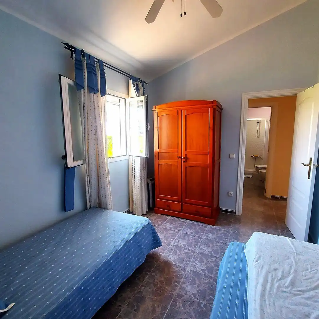 Habitación de Casa adosada en venta en Almonte con Terraza, Trastero y Balcón