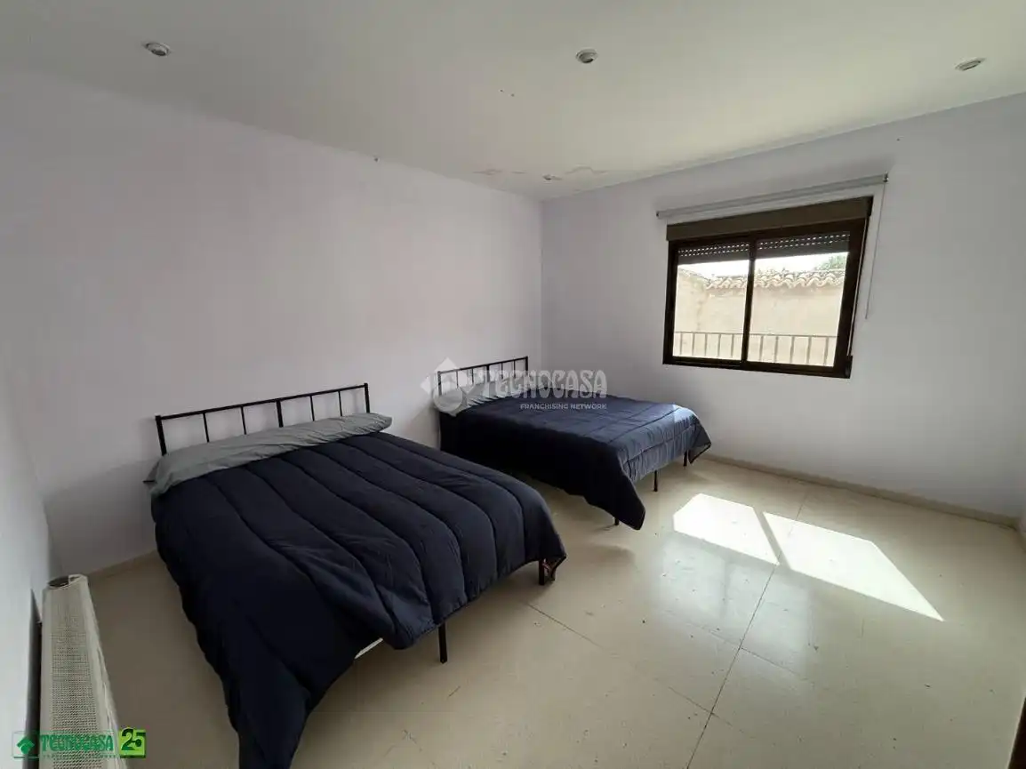 Dormitori de Casa adosada en venda en Granátula de Calatrava amb Aire condicionat