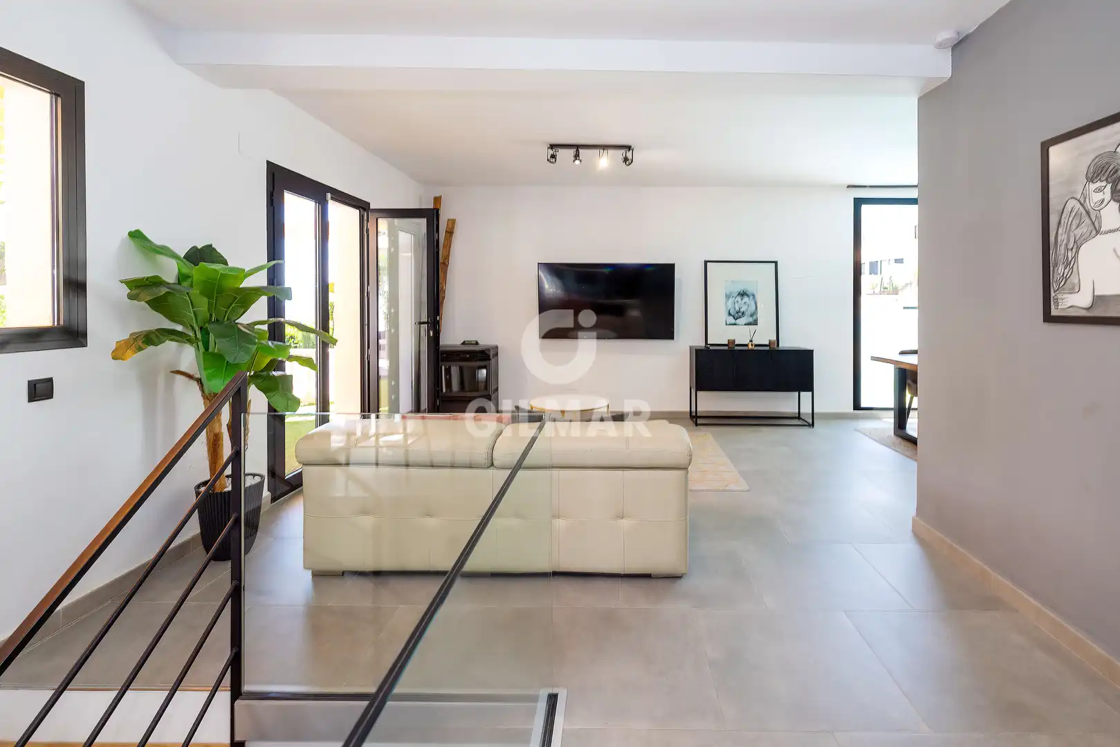 Sala d'estar de Casa o xalet en venda en Benalmádena amb Jardí privat i Piscina