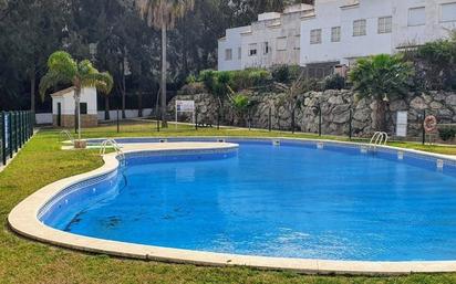 Swimming pool of Single-family semi-detached for sale in Salou  with Air Conditioner and Terrace