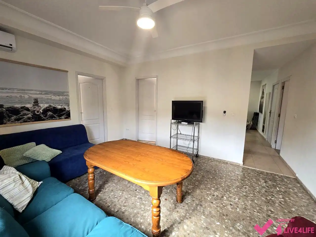 Living room of Flat for rent in Sevilla  with Air Conditioner, Terrace and Furnished