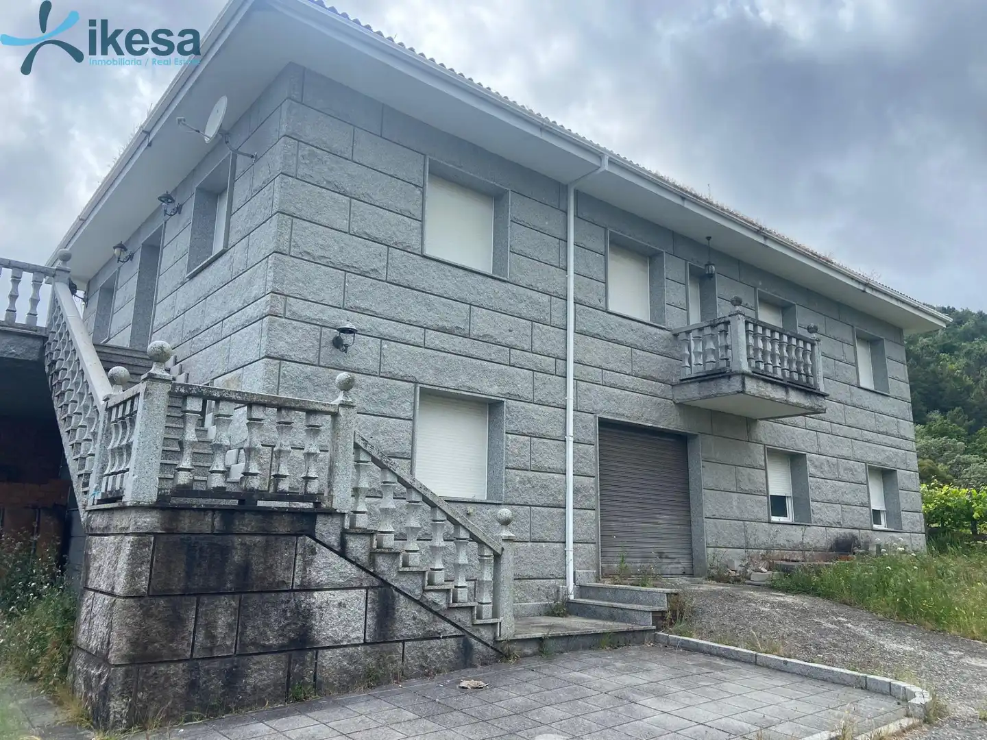Vista exterior de Casa o xalet en venda en Entrimo amb Jardí privat