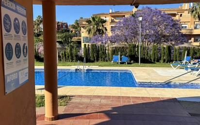 Piscina de Casa adosada en venda en Mijas amb Aire condicionat, Jardí privat i Terrassa