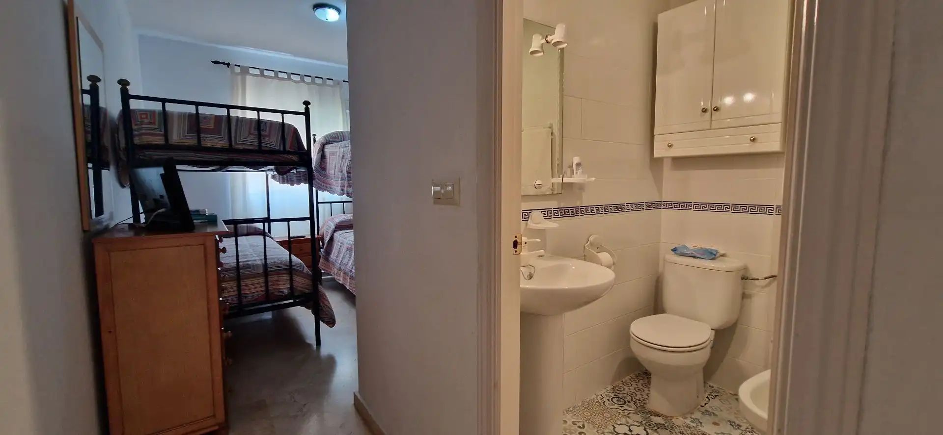 Dormitori de Apartament de lloguer en El Portil amb Moblat i Piscina comunitària