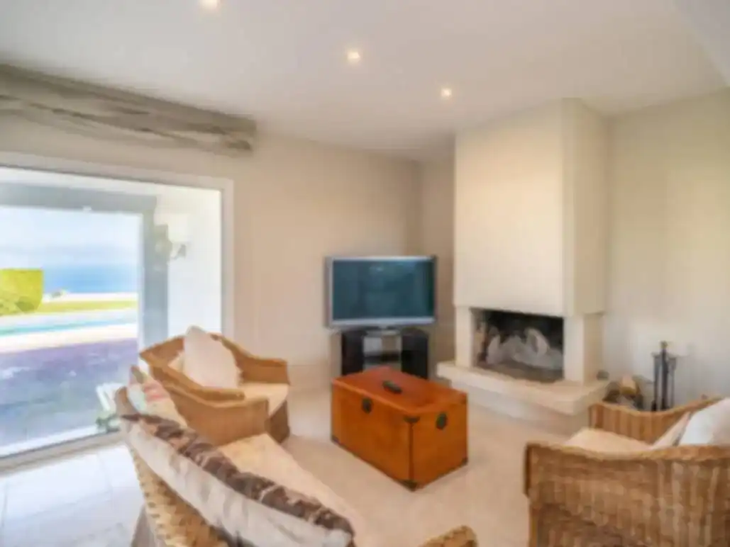 Sala de estar de Piso de alquiler en L'Escala con Aire acondicionado, Piscina y Amueblado