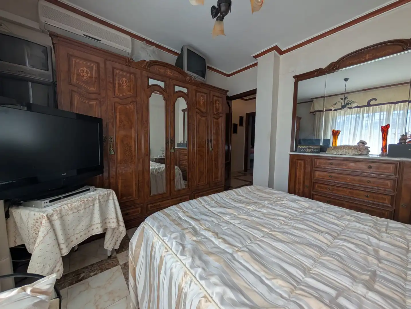 Habitación de Casa adosada en venta en Aljaraque con Aire acondicionado y Piscina comunitaria