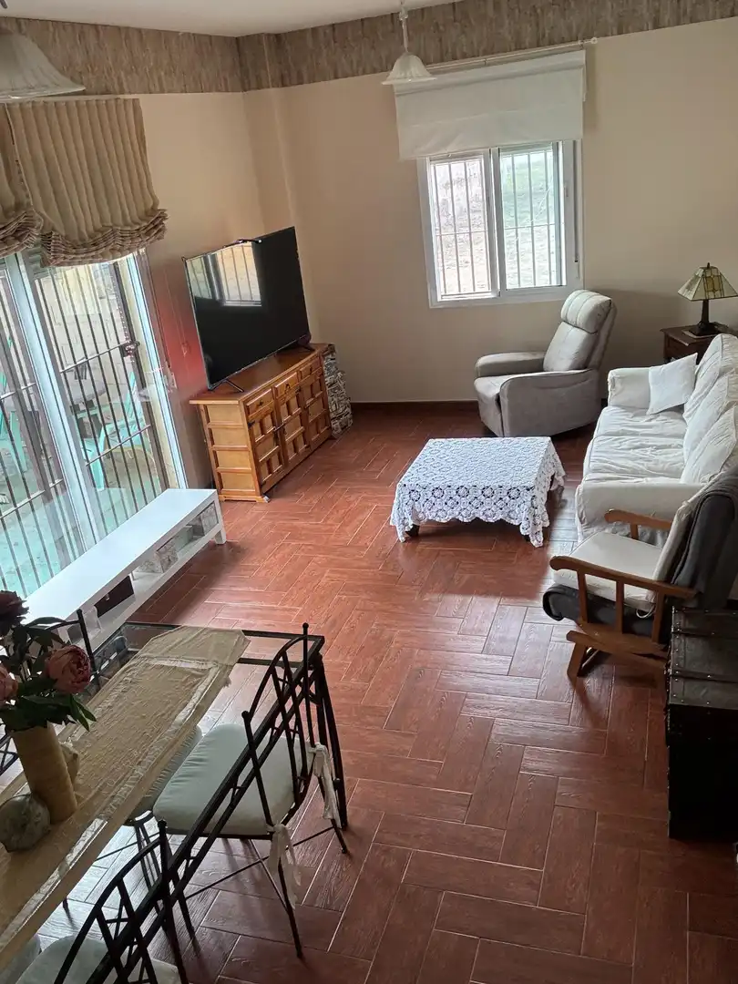 Sala d'estar de Casa o xalet en venda en Villanueva del Río y Minas amb Aire condicionat, Jardí privat i Terrassa