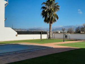 Vista exterior de Casa adosada en venda en Vegas del Genil amb Calefacció, Jardí privat i Parquet